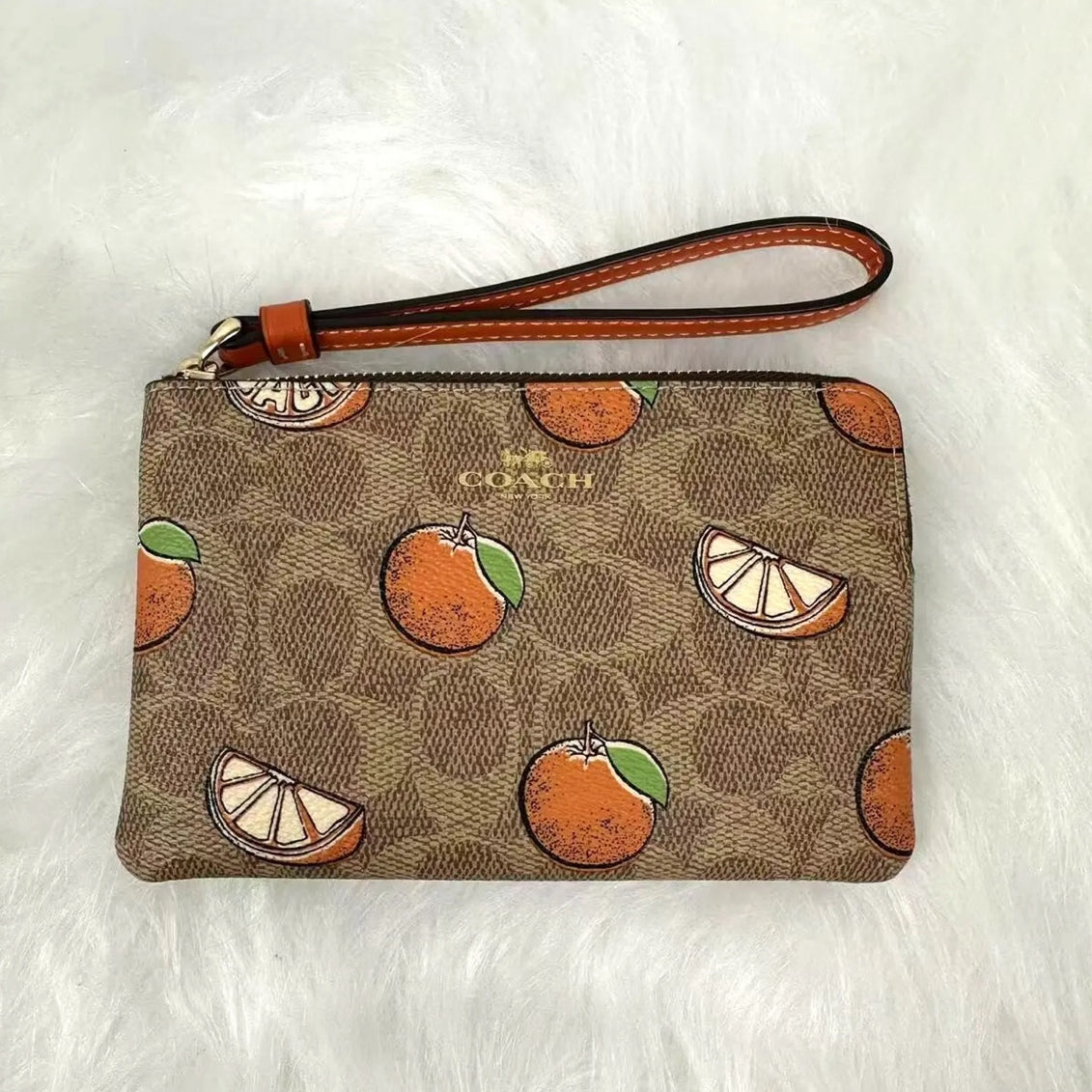 COACH ORANGES WRISTLET